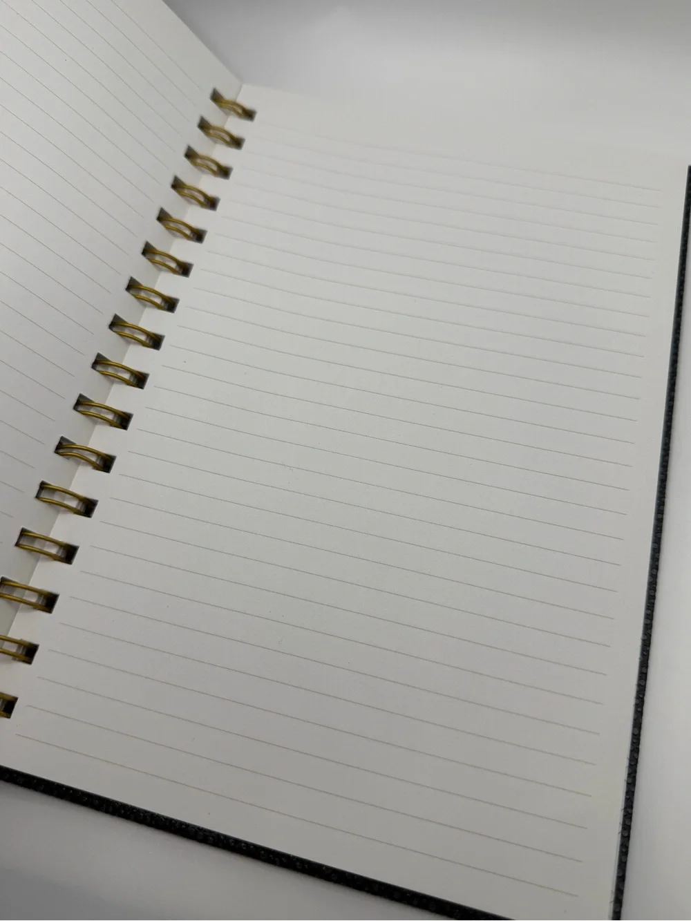 Textured Black Spiral Notebook with Gold Accents